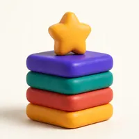 A finished stack of modelling-clay cards, crowned with a star.
