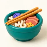 A modelling-clay bowl full of noodles, chopsticks resting on the rim.
