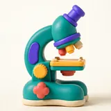 A modelling-clay microscope with a sample on the stage.